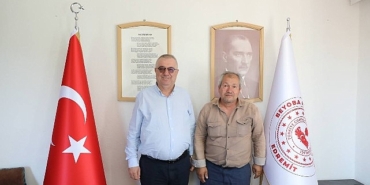 baskan-ertas-muhtarlari-tek-tek-ziyaret-etti.jpg